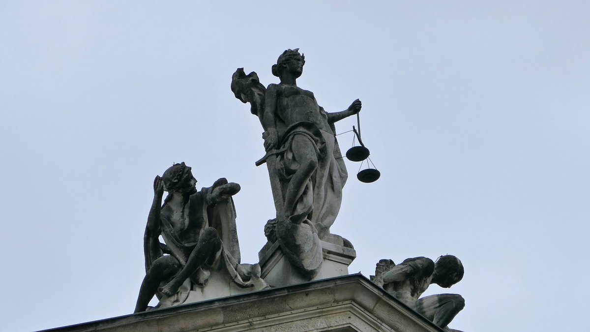 Justizia, Justis-Symbol